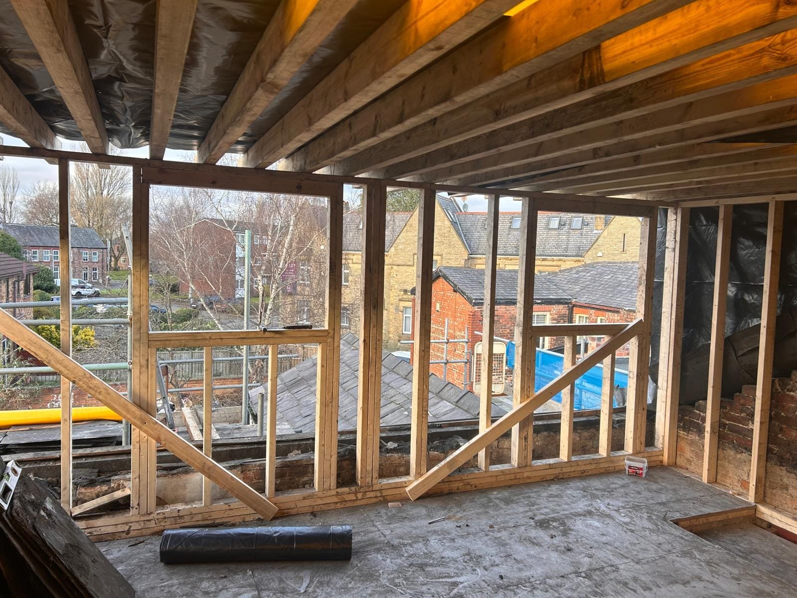Dormer level under construction with timber framing