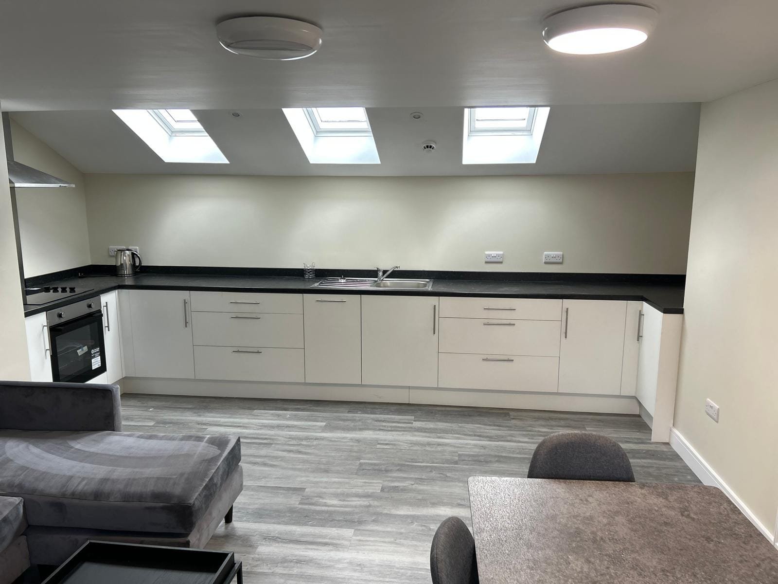 Finished upstairs kitchen and living space in the new dormer
