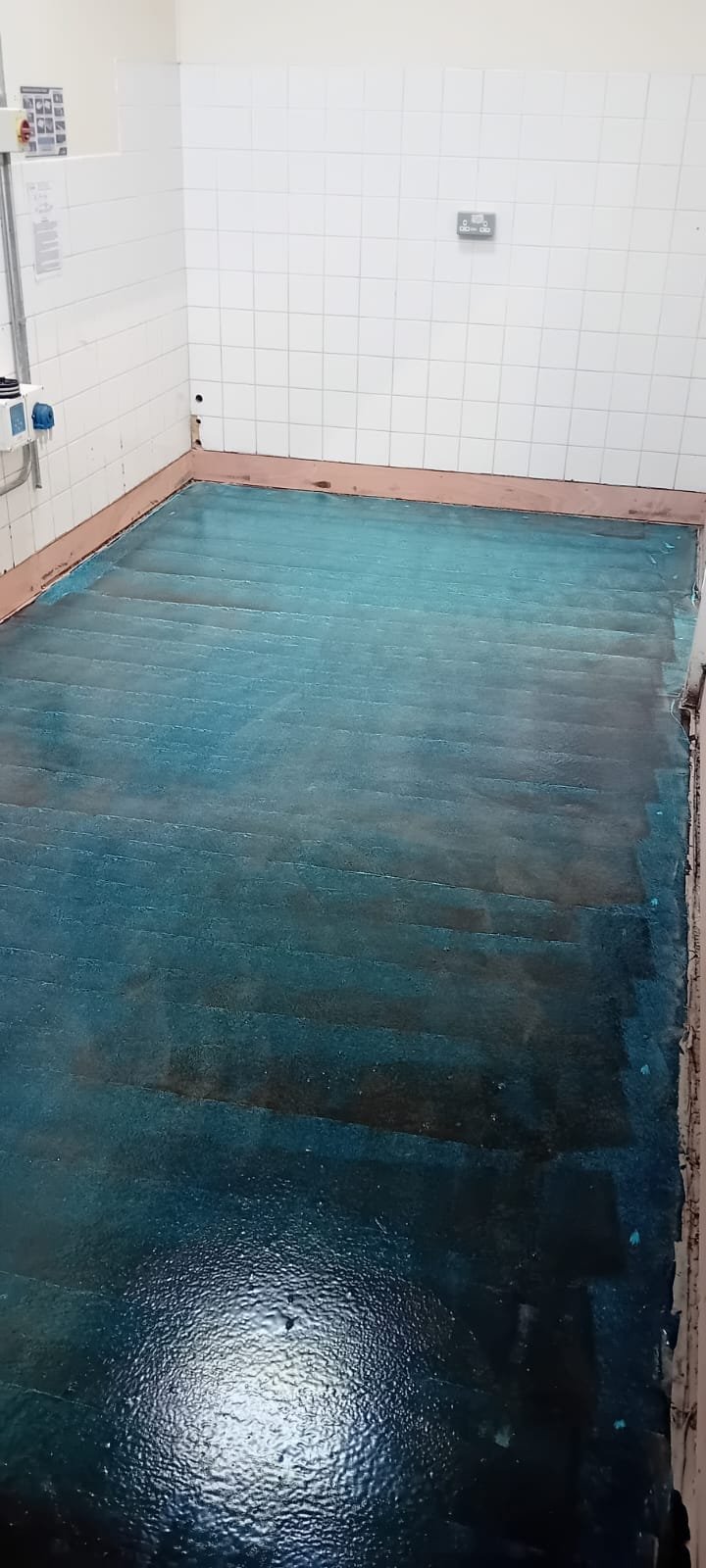 Flooring work in progress in the school kitchen